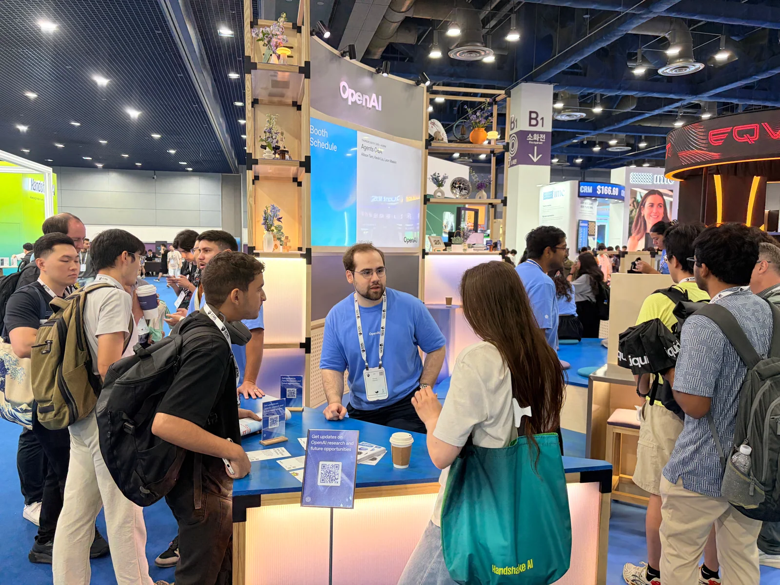 Busy ICML 2026 expo floor around the OpenAI booth